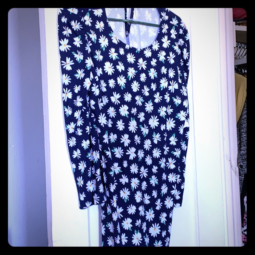 Long sleeved dress. Knee length